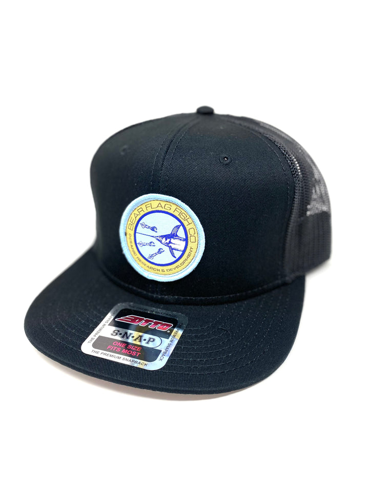 Light Blue Oceanic Research Trucker Hat Black - Bear Flag Fish Co. Pair your classic looks with a Light Blue Oceanic Research Patch hat. Given a classic hat silhouette, this accessory features a bold embroidered logo patch on the front crown while the back contains a classic snapback design.